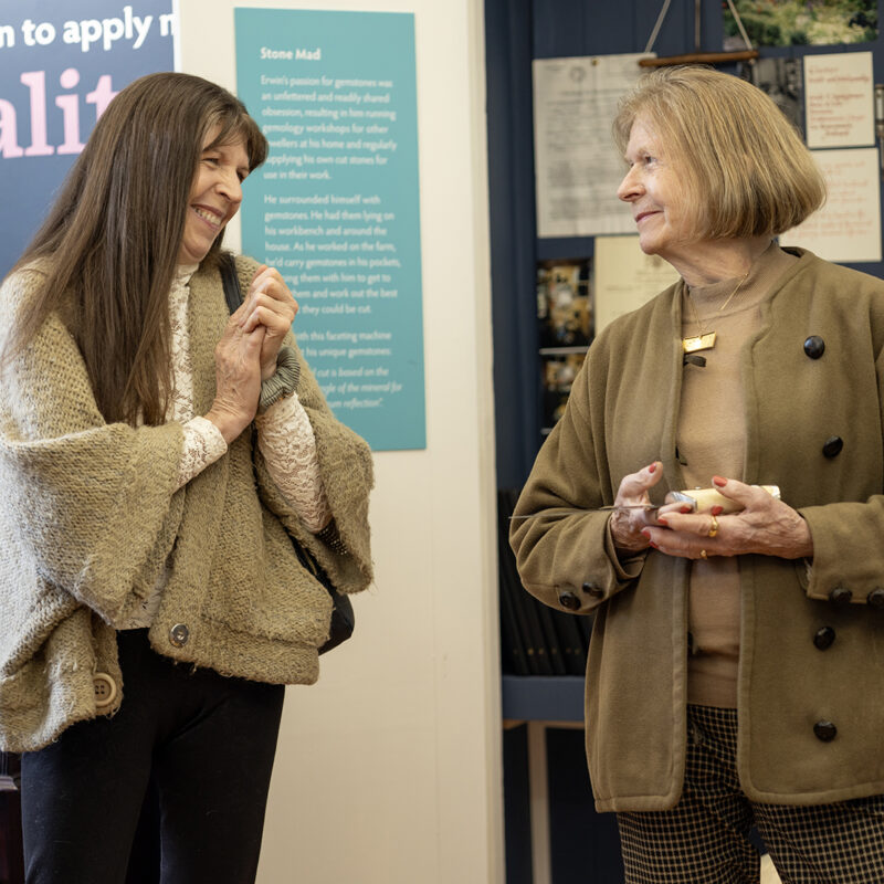 Group of visitors applauding a guide when explaining an attracti