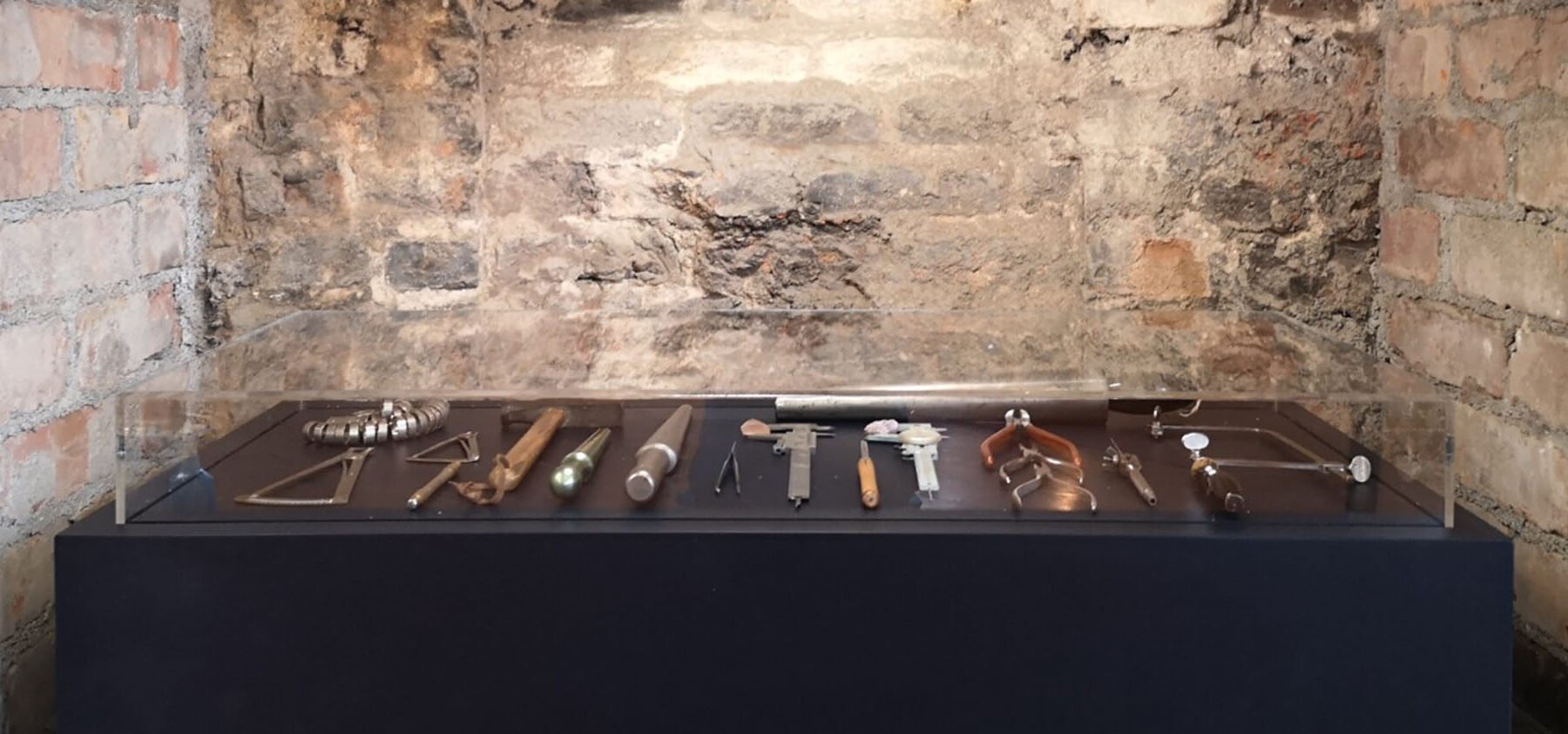 Hidden Gem Exhibition in King House tool display in the fireplace